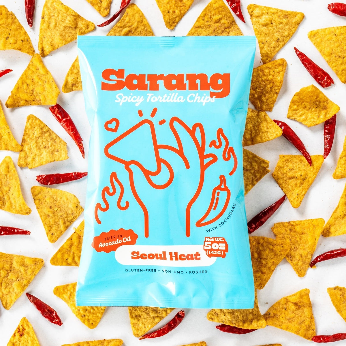 Sarang Seoul Heat bag on tortilla chips and dried red chilies